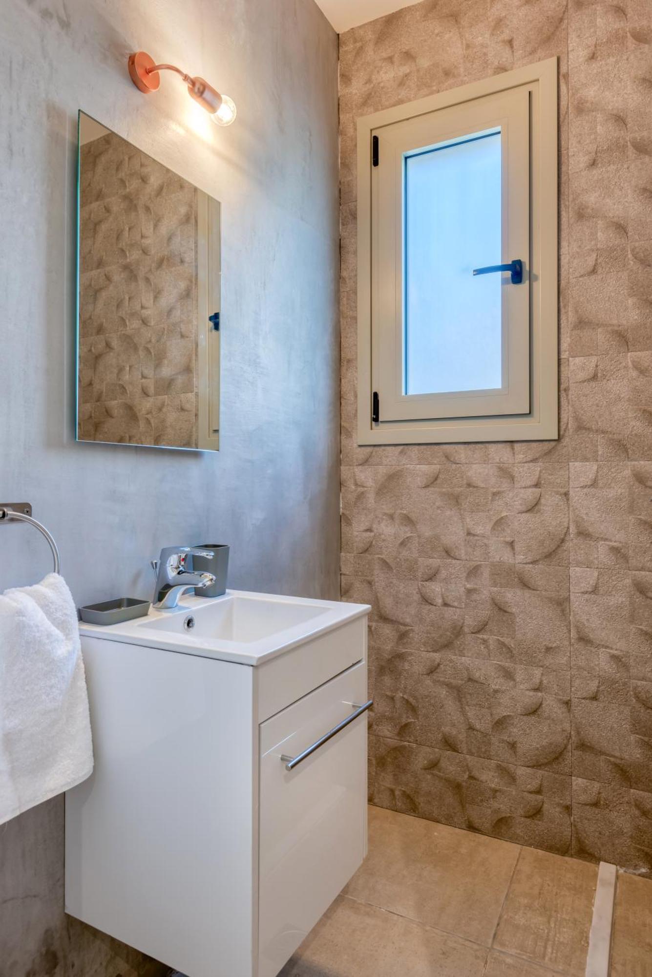 Saronis Suites Saronida Quarto foto